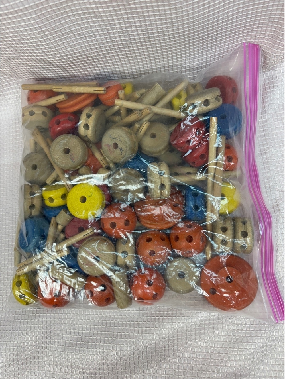 183 - 1.5 pound bag of assorted vintage wooden Tinkertoy pieces